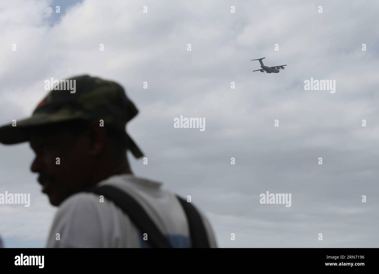 LA REUNION, Aug. 12, 2015 -- An aircraft searching for MH370 debris flies over the Saint Andre beach, France s oversea island La Reunion, on Aug. 12, 2015. La Reunion authority Monday said that no clues related to the missing flight MH370 has been found here since the launch of a tridimensional search last Friday. ) LA REUNION-MH370 DEBRIS-SEARCH-CONTINUE PanxSiwei PUBLICATIONxNOTxINxCHN   La Reunion Aug 12 2015 to Aircraft Searching for MH370 debris FLIES Over The Saint André Beach France S Oversea Iceland La Reunion ON Aug 12 2015 La Reunion Authority Monday Said Thatcher No clues RELATED to Stock Photo