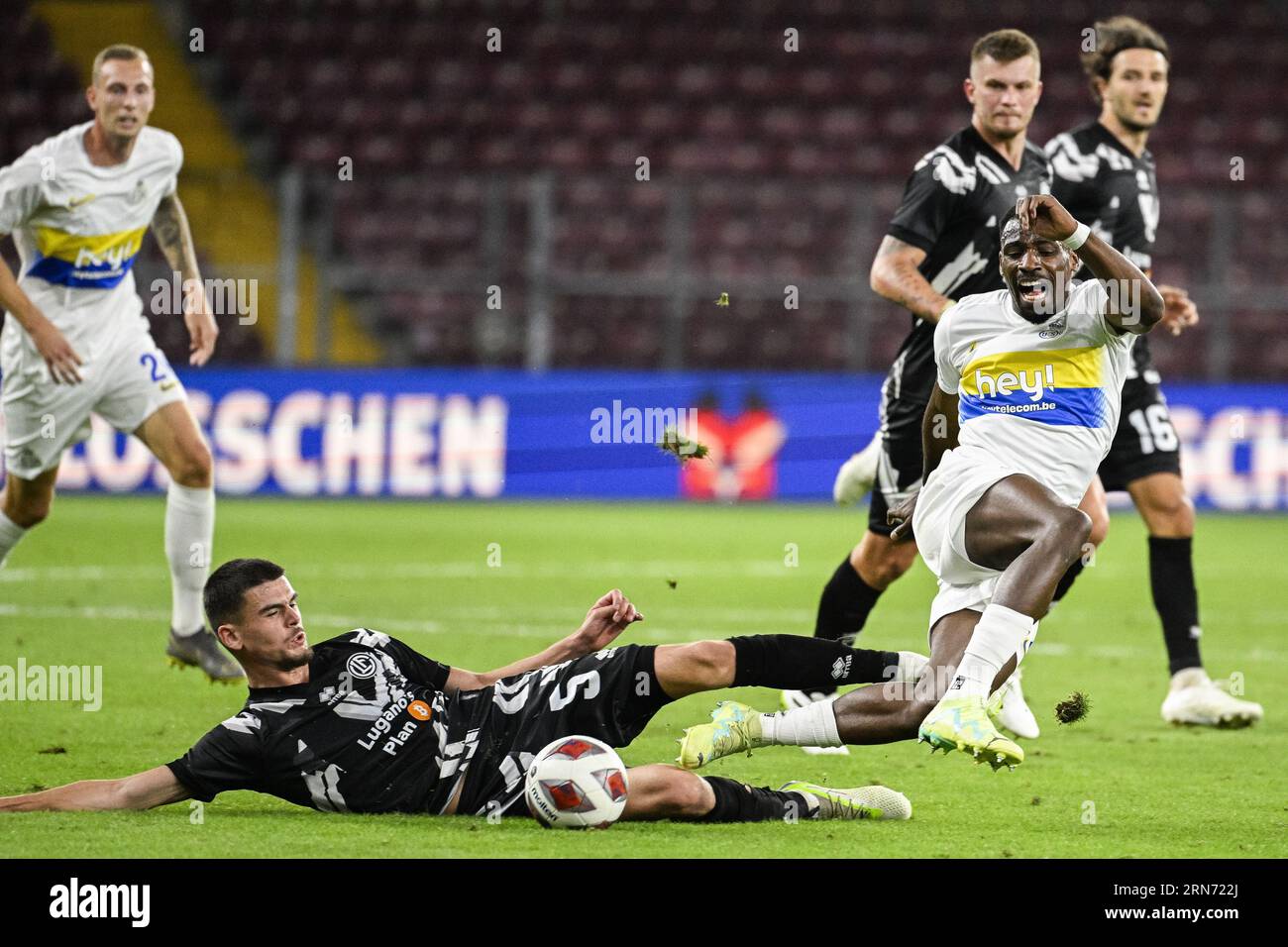 Lugano, Switzerland. 29th Nov, 2020. Cristopher Lungoyi (#8 FC Lugano) and  Albian Hajdari (#76 FC Basel 1893) in action during the Swiss Super League  match between FC Lugano and FC Basel 1893