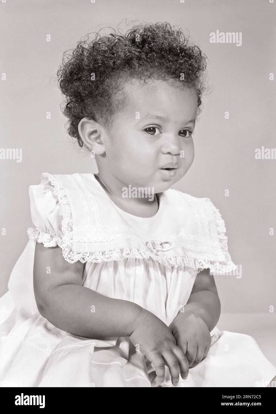 one year old black baby girl