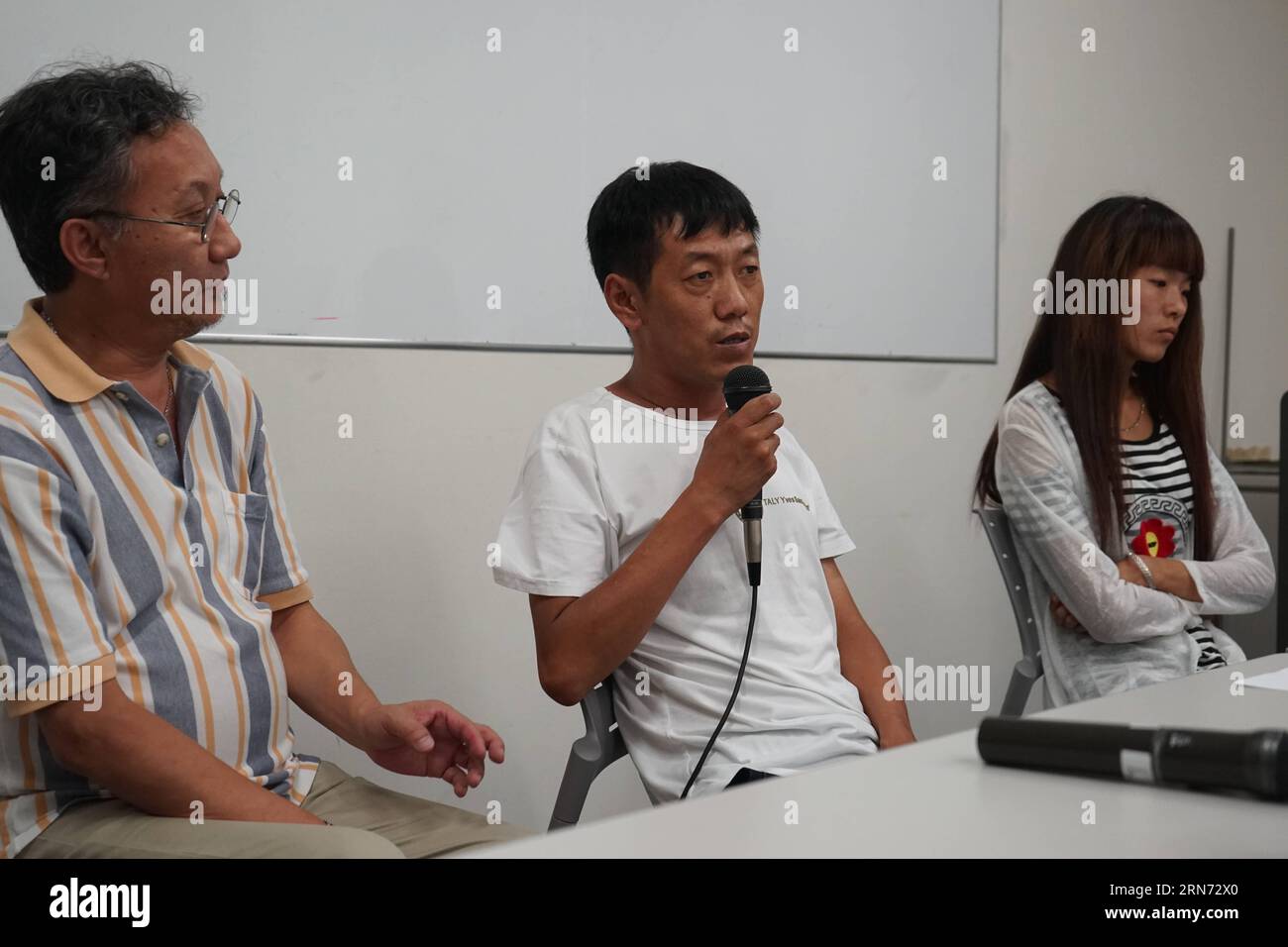 (150814) -- TOKYO, Aug. 14, 2015 -- A Chinese victim, who suffers from health problems caused by toxic gas weapon abandoned by Imperial Japanese Army troops, speaks in Tokyo, Japan, Aug. 14, 2015. A private-sector relief fund to support Chinese people suffering from health problems caused by chemical and biochemical weapons abandoned by Imperial Japanese Army troops was established in Tokyo on Friday. Representatives from Lawyers group supporting victims from poison gas weapons and China Foundation For Human Rights Development attended the inaugural ceremony of the Japan-China future peace fun Stock Photo