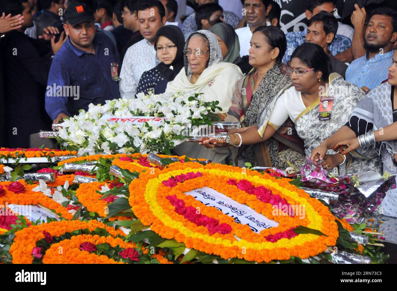 (150815) -- DHAKA, Aug. 15, 2015 -- Bangladeshi people pay homage to Bangladesh s founding father and first president Sheikh Mujibur Rahman s memorial in Dhaka, Bangladesh, Aug. 15, 2015. The nation commemorated on Friday the 40th death anniversary of Bangladesh s founding father and first president Sheikh Mujibur Rahman who was assassinated on Aug. 15, 1975. ) BANGLADESH-DHAKA-DEATH ANNIVERSARY-FIRST PRESIDENT SharifulxIslam PUBLICATIONxNOTxINxCHN   150815 Dhaka Aug 15 2015 Bangladeshi Celebrities Pay Homage to Bangladesh S Founding Father and First President Sheikh Mujibur Rahman S Memorial Stock Photo