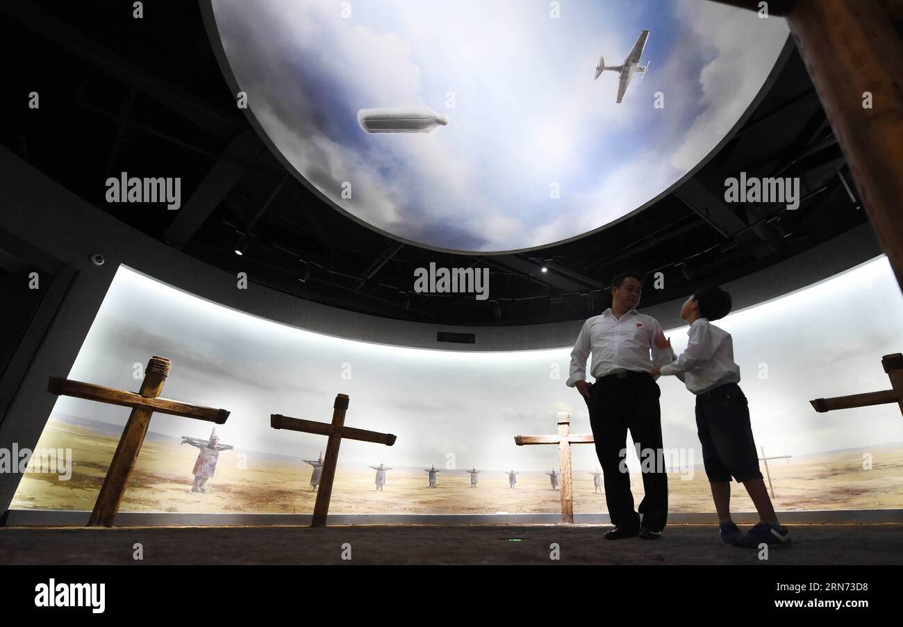 (150815) -- HARBIN, Aug. 15, 2015 -- South Korean visitors are seen at the newly-opened museum about Japanese Army Unit 731 wartime atrocities in Harbin, capital of northeast China s Heilongjiang Province, Aug. 15, 2015. The Museum of Evidence of War Crimes by Japanese Army Unit 731, located on the site of former headquarters of Japanese army unit 731 in Harbin, opened on Saturday. Unit 731 was a biological and chemical warfare research base established in 1935. At least 3,000 people died at the base between 1939 and 1945, mostly in experiments for the development of biological weapons. ) (mt) Stock Photo