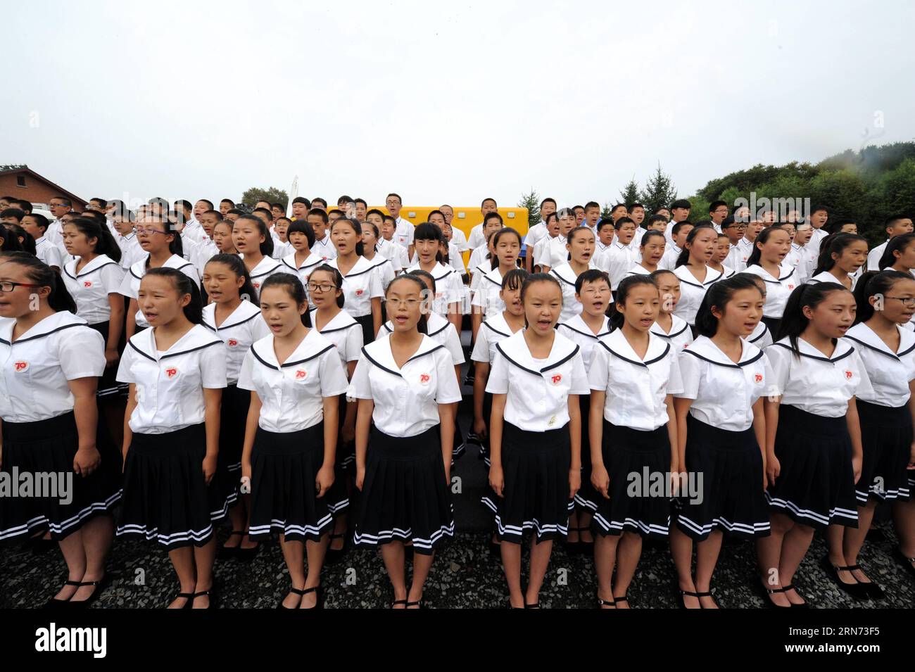 (150815) -- HARBIN, Aug. 15, 2015 -- Students attend the opening ceremony of a museum about Japanese Army Unit 731 wartime atrocities in Harbin, capital of northeast China s Heilongjiang Province, Aug. 15, 2015. The Museum of Evidence of War Crimes by Japanese Army Unit 731, located on the site of former headquarters of Japanese army unit 731 in Harbin, opened on Saturday. Unit 731 was a biological and chemical warfare research base established in 1935. At least 3,000 people died at the base between 1939 and 1945, mostly in experiments for the development of biological weapons. ) (mt) CHINA-HA Stock Photo