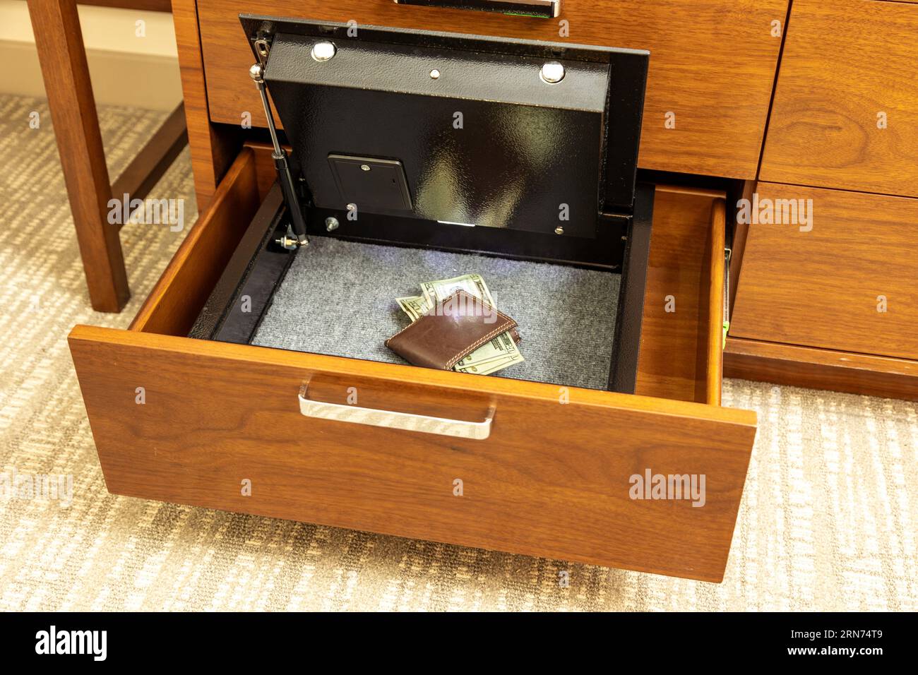Money and valuables in hotel room safe Stock Photo Alamy