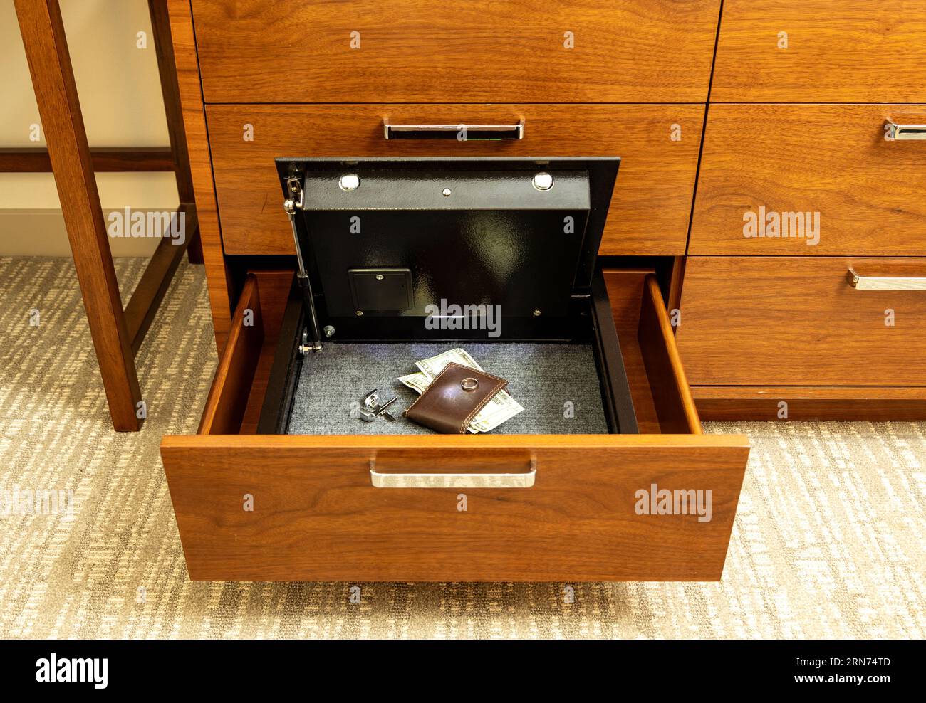 Money and valuables in hotel room safe Stock Photo Alamy