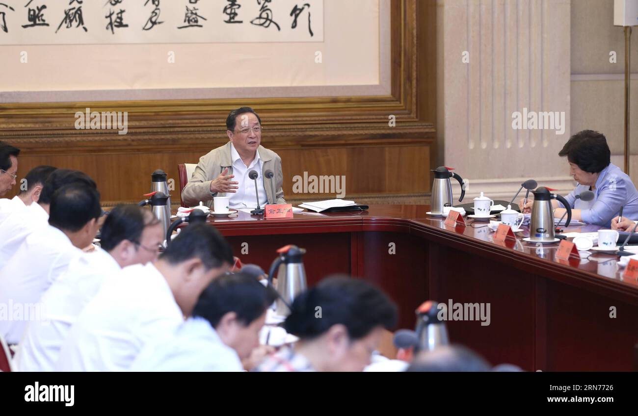 (150821) -- BEIJING, Aug. 21, 2015 -- Yu Zhengsheng, chairman of the National Committee of the Chinese People s Political Consultative Conference, presides over a symposium to solicit opinions and suggestions from China National Democratic Construction Association Central Committee, Chinese Peasants and Workers Democratic Party Central Committee, China Zhi Gong Party Central Committee and the Jiu San Society Central Committee on drainage basin economic development and water resources development and protection, in Beijing, capital of China, Aug. 21, 2015. )(mcg) CHINA-BEIJING-YU ZHENGSHENG-SYM Stock Photo