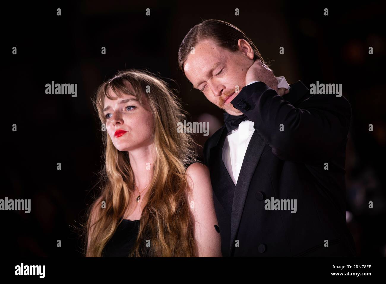 Caleb Landry Jones, right, and Katya Zvereva pose for photographers