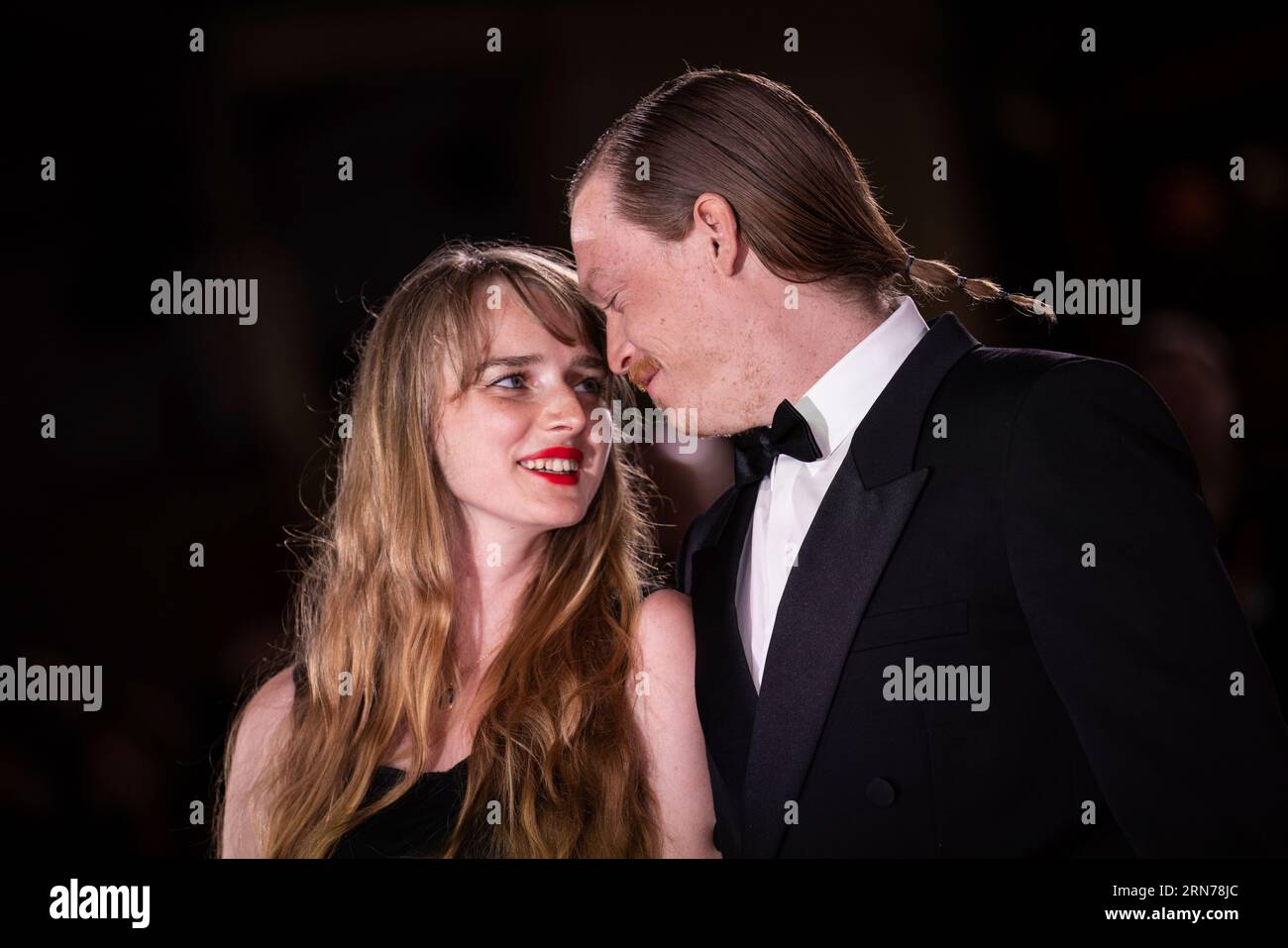 Caleb Landry Jones, right, and Katya Zvereva pose for photographers