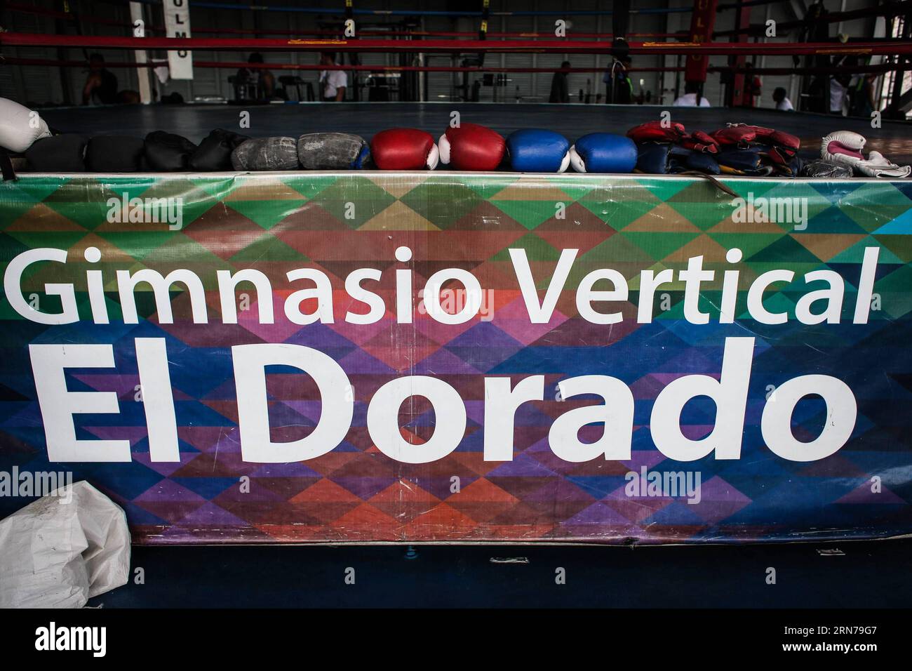 Image taken on Aug. 19, 2015 shows boxing gloves at El Dorado Vertical Gym, located in Francisco de Miranda avenue, in Buena Vista sector of Petare, Sucre municipality, Caracas Metropolitan Area, Venezuela. The Juan Montoya boxing academy, currently located at El Dorado Vertical Gym, is one of the schools serving the zones of Petare for 16 years, training the future boxers. One of the initiatives of the academy is to bring the sport closer to the communities through the training of young people. It has 7 floors, 4 of them designed for sports in the municipality, offering more than 19 sport dis Stock Photo