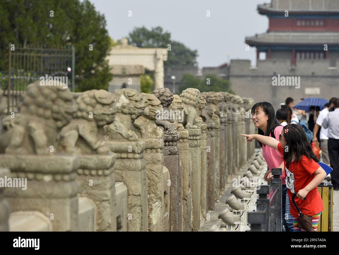 (150829) -- BEIJING, Aug. 29, 2015 -- People visit Lugou Bridge where Japan launched the all-out war of aggression against China, in Beijing, Capital of China, Aug. 29, 2015. China will stage a military parade on Sept. 3 to commemorate the 70th anniversary of the victory of the Chinese People s War of Resistance Against Japanese Aggression and the World Anti-Fascist War. ) (dhf) CHINA-BEIJING-COUNTER-JAPANESE WAR OF AGGRESSION-SITE-VISIT (CN) PengxZhaozhi PUBLICATIONxNOTxINxCHN   150829 Beijing Aug 29 2015 Celebrities Visit Lugou Bridge Where Japan launched The All out was of Aggression agains Stock Photo