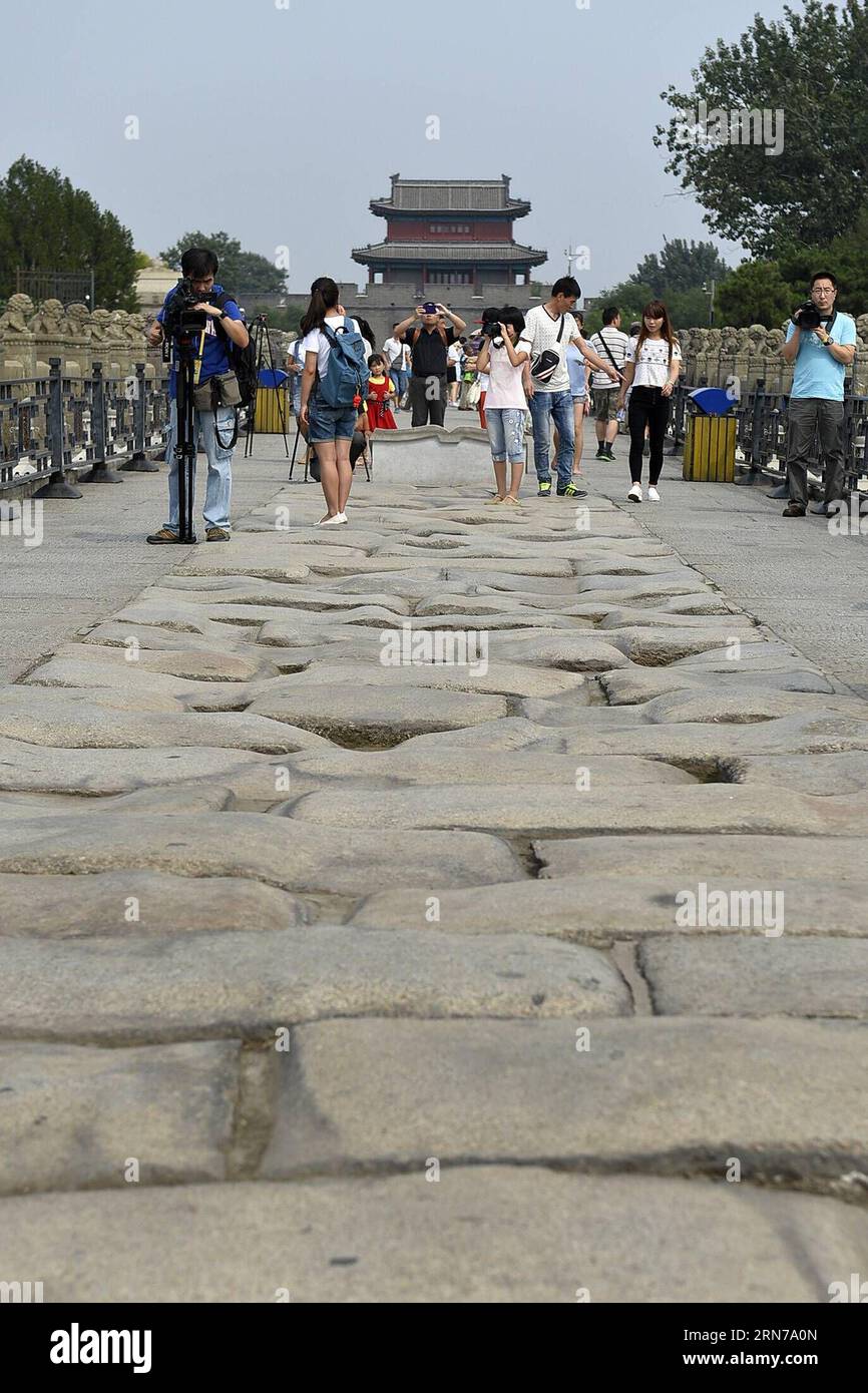 (150829) -- BEIJING, Aug. 29, 2015 -- People visit Lugou Bridge where Japan launched the all-out war of aggression against China, in Beijing, Capital of China, Aug. 29, 2015. China will stage a military parade on Sept. 3 to commemorate the 70th anniversary of the victory of the Chinese People s War of Resistance Against Japanese Aggression and the World Anti-Fascist War. ) (dhf) CHINA-BEIJING-COUNTER-JAPANESE WAR OF AGGRESSION-SITE-VISIT (CN) PengxZhaozhi PUBLICATIONxNOTxINxCHN   150829 Beijing Aug 29 2015 Celebrities Visit Lugou Bridge Where Japan launched The All out was of Aggression agains Stock Photo