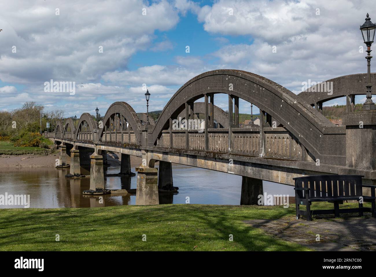 Kirkcudbright, Scotland, UK - April 25th 2023 - Bridge over the river Dee leading into Kirkcudbright on a sunny day Stock Photo