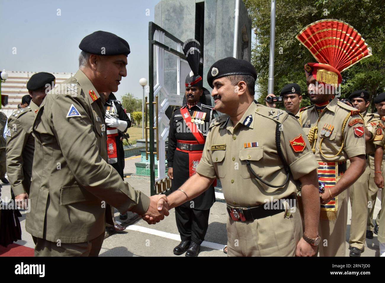 (150909) -- WAGAH, Sep. 9, 2015 -- Photo released by on Sept. 9, 2015 shows Director General, Maj. Gen. Umar Farooq Burki (L) shaking hands with Indian Border Security Force (BSF) Inspector General (IG) Anil Paliwal at Pakistan s side of Wagah border. A high-level delegation from Pakistan crossed over into India on Wednesday at the Attari-Wagah joint check post in the northwest state Punjab for director-level talks between border forces of both countries, said local media. (djj) PAKISTAN-WAGAH-INDIA-BORDER SITUATION TALKS PakistanxRangers PUBLICATIONxNOTxINxCHN   150909 Wagah Sep 9 2015 Photo Stock Photo