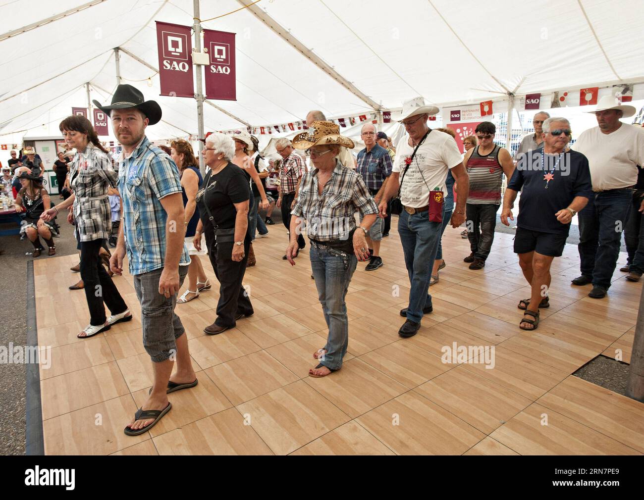 (150916) -- QUEBEC, Sept. 16, 2015 -- People attend the Western Festival in Quebec, Canada, Sept. 16, 2015. The village of St-Tite, Canada, hosted more than 600,000 visitors for the two-week Western Festival St-Tite which is also east Canada s largest Rodeo. In addition to traditional rodeo competitions, there are also multiple cultural activities. ) CANADA-QUEBEC-WESTERN-FESTIVAL-RODEO AndrewxSoong PUBLICATIONxNOTxINxCHN   Quebec Sept 16 2015 Celebrities attend The Western Festival in Quebec Canada Sept 16 2015 The Village of St tite Canada hosted More than 600 000 Visitors for The Two Week W Stock Photo