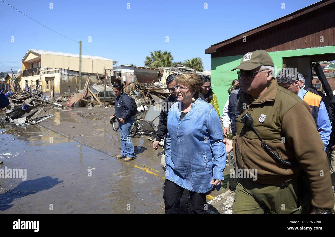AKTUELLES ZEITGESCHEHEN Erdbeben in Chile, Präsidentin Bachelet besucht Unglücksregion (150917) -- COQUIMBO, Sept. 17, 2015 -- Image provided by Chile s Presidency shows Chilean President Michelle Bachelet (L) inspecting the coastal area in Coquimbo City, Chile, Sept. 17, 2015. The coastal area in Coquimbo City was damaged by the tsunami following the recent earthquak. The earthquake has so far left ten people dead, according to the Chile s National Office for Emergencies of the Ministry of Interior and Public Security (ONEMI), in addition to the evacuation of a million people. Sebastian Rodri Stock Photo