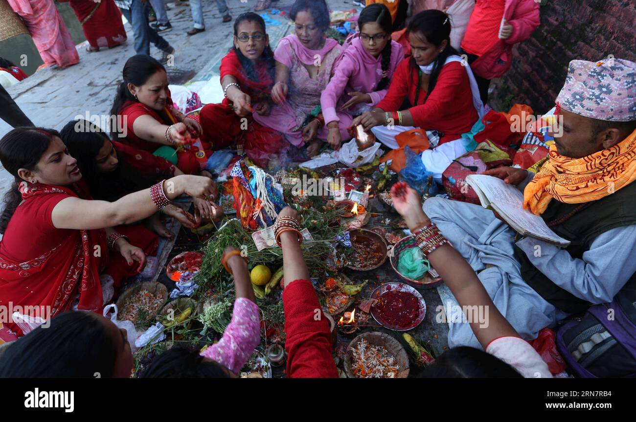(150918) -- KATHMANDU, Sept. 18, 2015 -- Nepalese Hindu women worship the Saptarishi during the Rishi Panchami festival on the bank of Bagmati River in Kathmandu, Nepal, Sept. 18, 2015. Rishi Panchami marks the end of the three-day Teej festival, in which married women fast and pray for health of their husbands to Shiva, the Hindu god of destruction, while unmarried women wish for handsome husbands and happy conjugal lives. ) NEPAL-KATHMANDU-RISHI PANCHAMI FESTIVAL SunilxSharma PUBLICATIONxNOTxINxCHN   Kathmandu Sept 18 2015 Nepalese Hindu Women Worship The  during The Rishi Panchami Festival Stock Photo