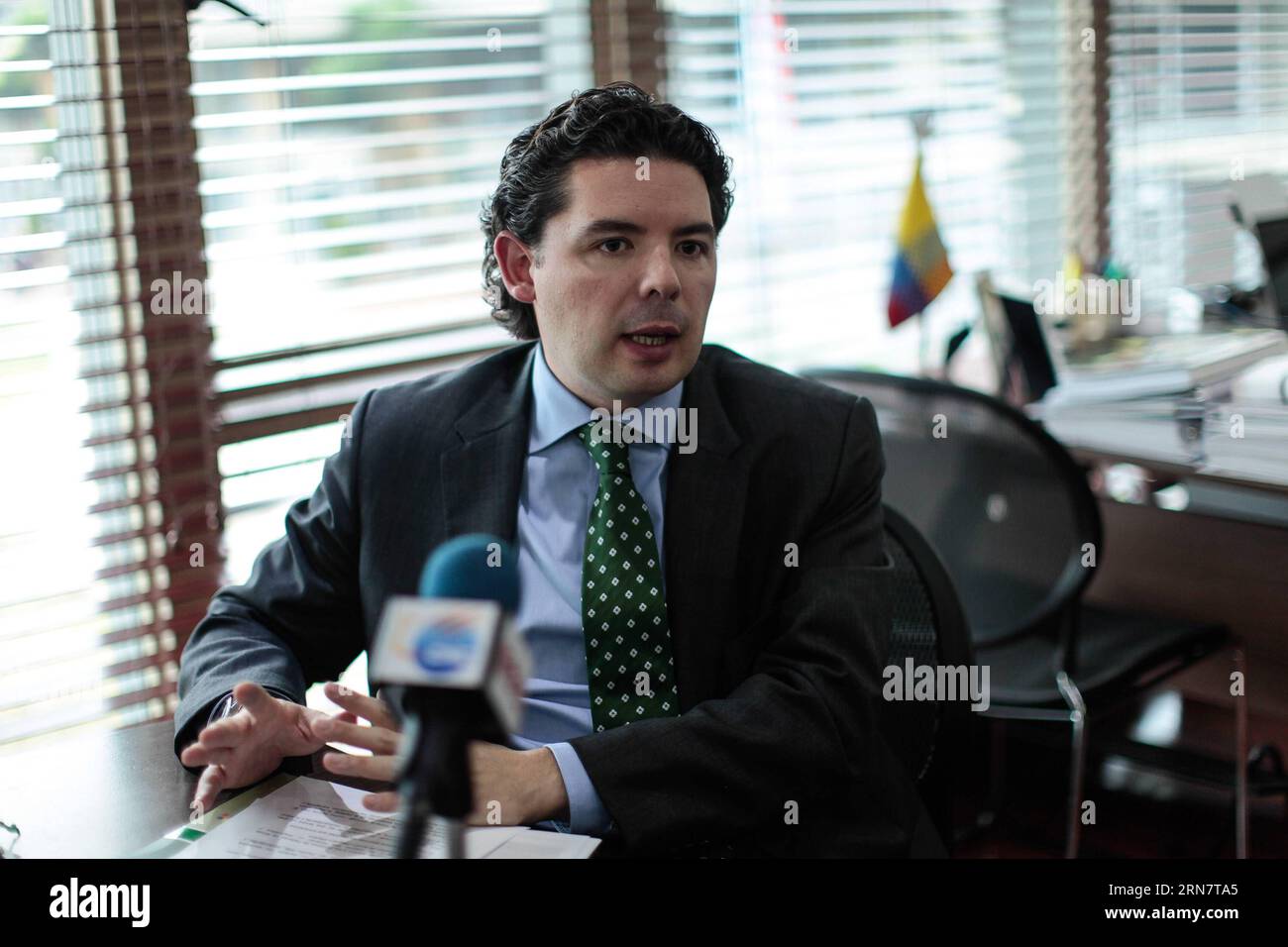 Photo taken on Sept. 17, 2015 shows Colombian deputy Defense Minister for International Politics and Affairs Anibal Fernandez de Soto receiving an interview with Xinhua News Agency in Bogota city, capital of Colombia. Colombian Government began to take measures against the increase in several regions of the country of illegal mining, that is developed specially by the guerrillas and criminal bands that exploit the mineral resources of the country irregularly and are leaving severe damages to the environment. Anibal Fernandez de Soto explained that the irregular groups have found more earnings Stock Photo