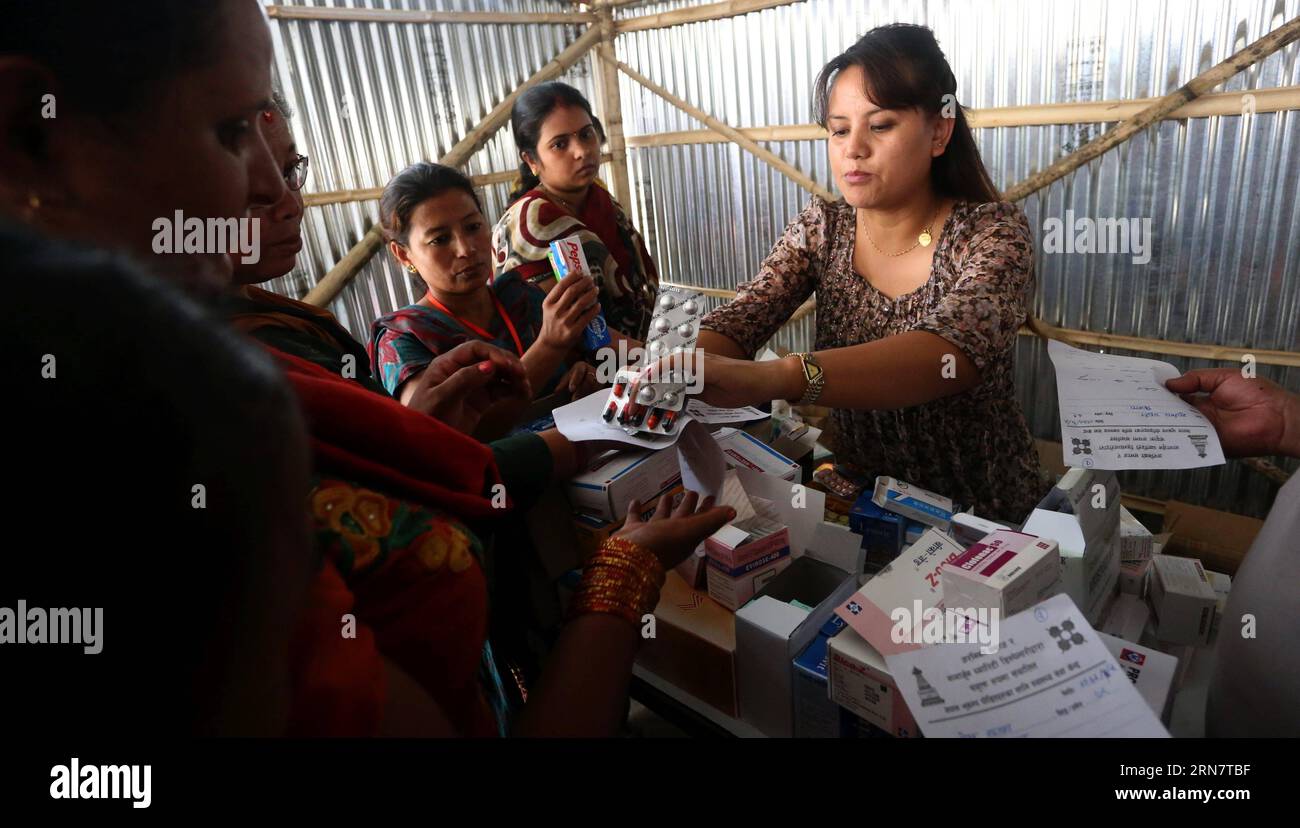 Nepalese people take medicines after a checkup at a free health camp organized for earthquake victims by Araniko Society at Itumbahal in Kathmandu, capital of Nepal, on Sept. 19, 2015. ) NEPAL-KATHMANDU-EARTHQUAKE VICTIMS-FREE HEALTH CAMP SunilxSharma PUBLICATIONxNOTxINxCHN   Nepalese Celebrities Take Medicines After a checkup AT a Free Health Camp Organized for Earthquake Victims by Araniko Society AT  in Kathmandu Capital of Nepal ON Sept 19 2015 Nepal Kathmandu Earthquake Victims Free Health Camp SunilxSharma PUBLICATIONxNOTxINxCHN Stock Photo