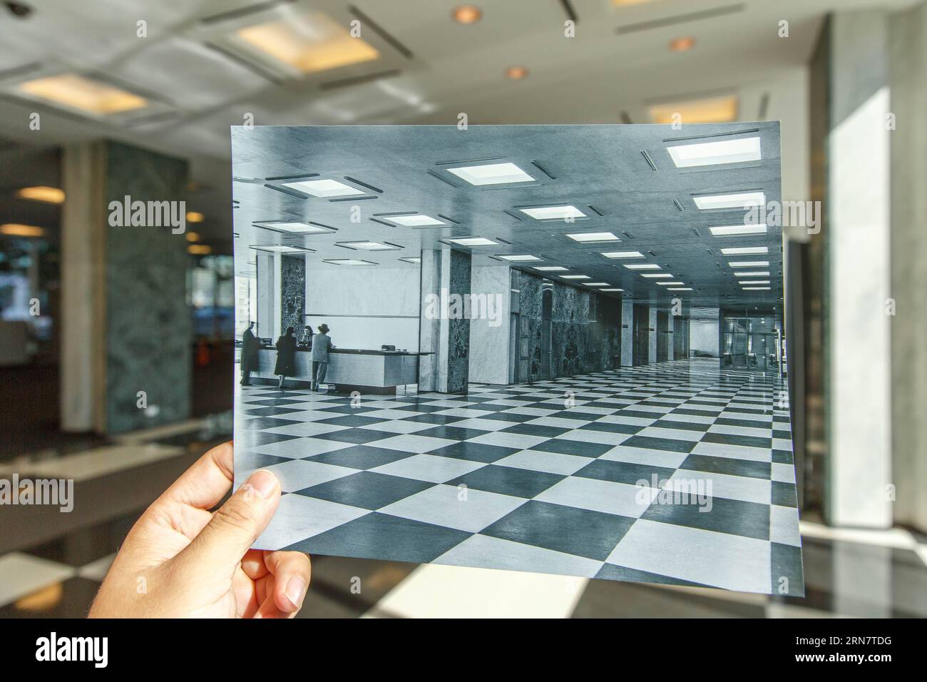 Photo taken on Sept. 19, 2015 shows the main lobby of the United Nations Secretariat building in New York, compared with a photo taken at the same place on April 20, 1951. In 1945, representatives of 50 countries met in San Francisco at the the United Nations Conference on International Organization to draw up the United Nations Charter, which was signed on June 26, 1945 by representatives of 50 countries. The United Nations officially came into existence on Oct. 24, 1945, when the Charter had been ratified by China, France, the Soviet Union, the United Kingdom, the United States and by a majo Stock Photo