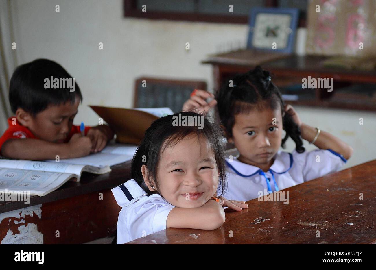 (150926) -- PHONGSALY, Sept. 26, 2015 -- A girl smiles at school in Phongsaly, Laos, Sept. 17, 2015. )(zhf) LAOS-PHONGSALY-CHILDREN LiuxAilun PUBLICATIONxNOTxINxCHN   Phongsaly Sept 26 2015 a Girl Smiles AT School in Phongsaly Laos Sept 17 2015 zhf Laos Phongsaly Children LiuxAilun PUBLICATIONxNOTxINxCHN Stock Photo