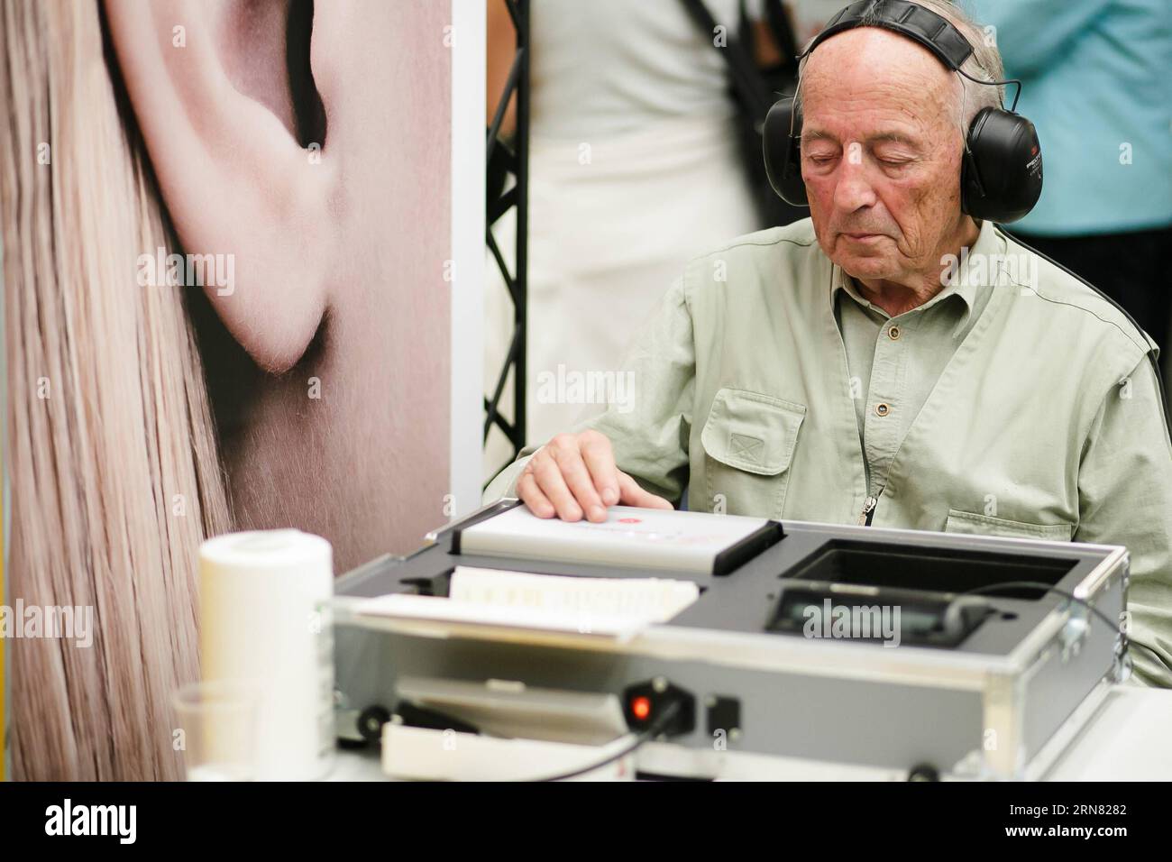 A man takes a hearing test at the 15th Festival for Third Age in Ljubljana,  Slovenia, Sept. 30, 2015. The Festival for Third Age in Ljubljana, the  largest of its kind in