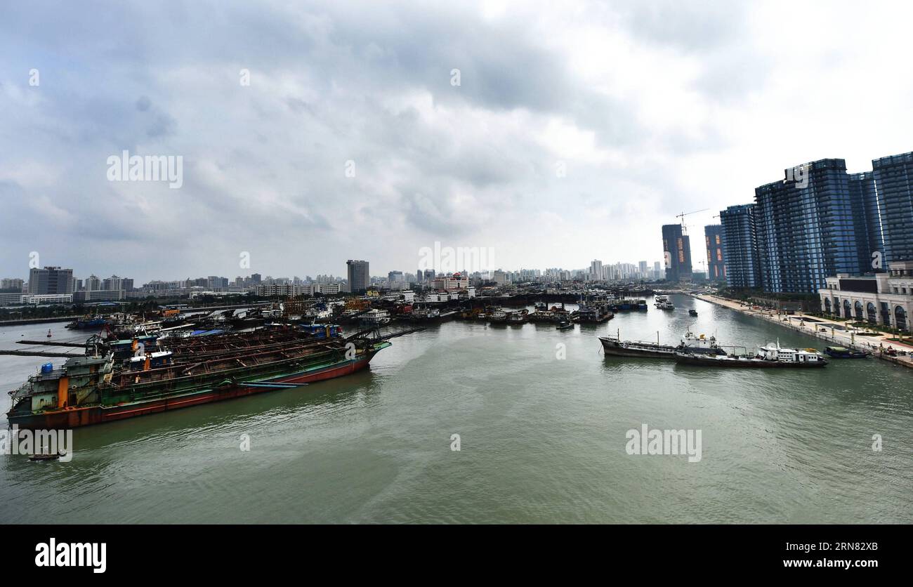 (151003) -- HAIKOU, Oct. 3, 2015 -- Ships berth at Xingang harbor in Haikou, capital of south China s Hainan Province, Oct. 3, 2015. A tropical depression strengthened to become Typhoon Mujigae early Friday morning, and the storm was still gathering power as it entered the eastern part of the South China sea. ) (zkr) CHINA-HAINAN-TYPHOON MUJIGAE-APPROACHING(CN) ZhaoxYingquan PUBLICATIONxNOTxINxCHN   Haikou OCT 3 2015 Ships Berth AT Xingang Harbor in Haikou Capital of South China S Hainan Province OCT 3 2015 a Tropical Depression strengthened to Become Typhoon Mujigae Early Friday Morning and T Stock Photo