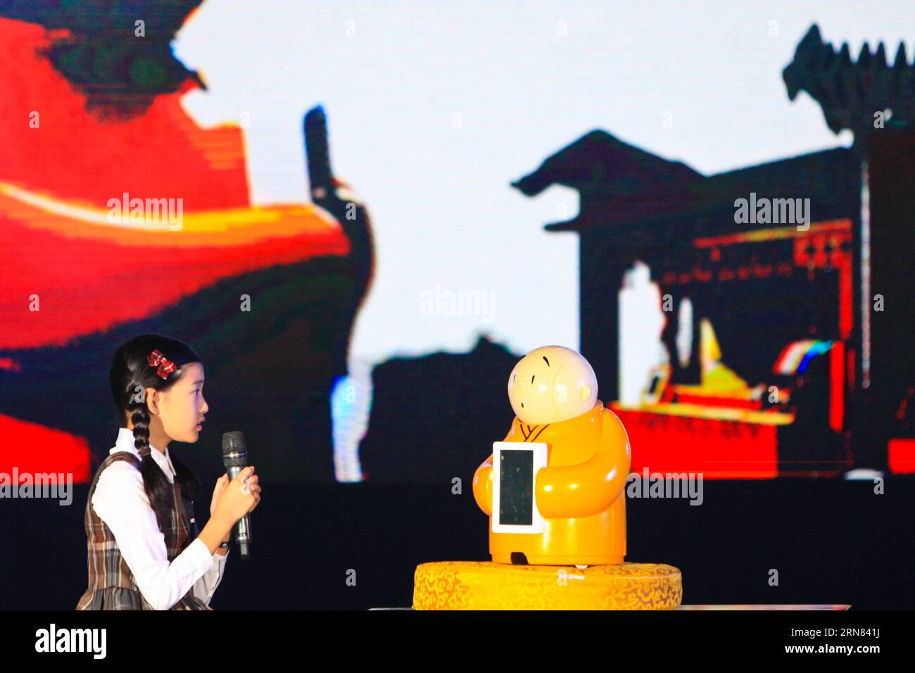 A robot named Xian Er is unveiled during the National Day Gala at