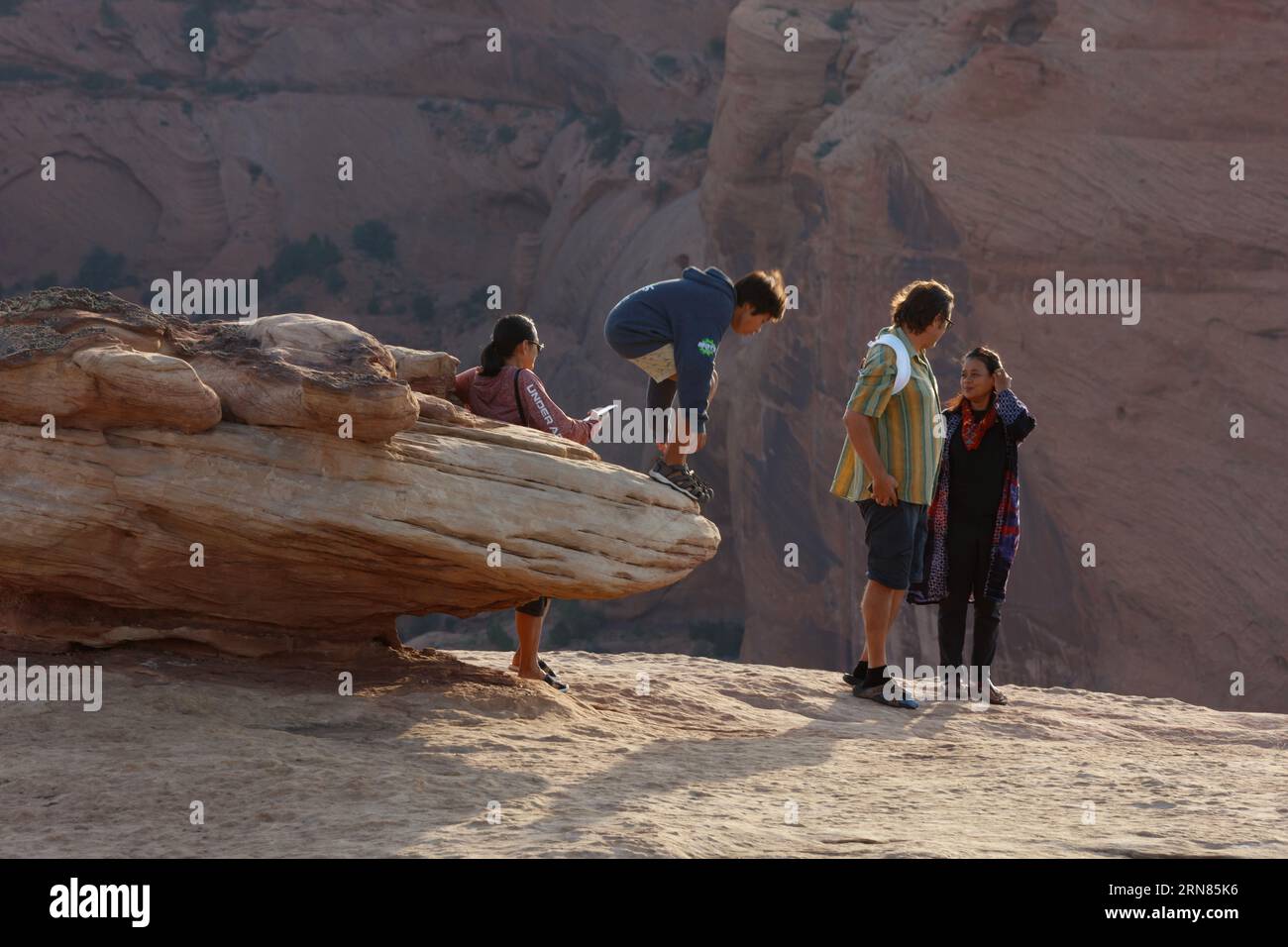 Visitors  at Tsegi Overlook on the South Rim drive of Canyon De Chelly National Monument - Navajo Indian Reservation, Arizona Stock Photo