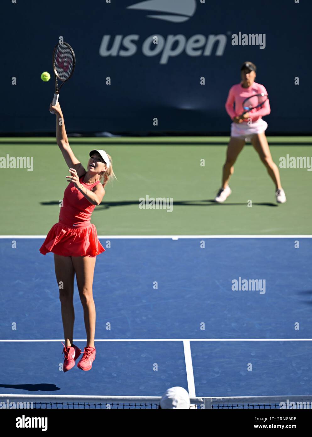 Katie Boulter and Yulia Putintseva in action during a women's doubles