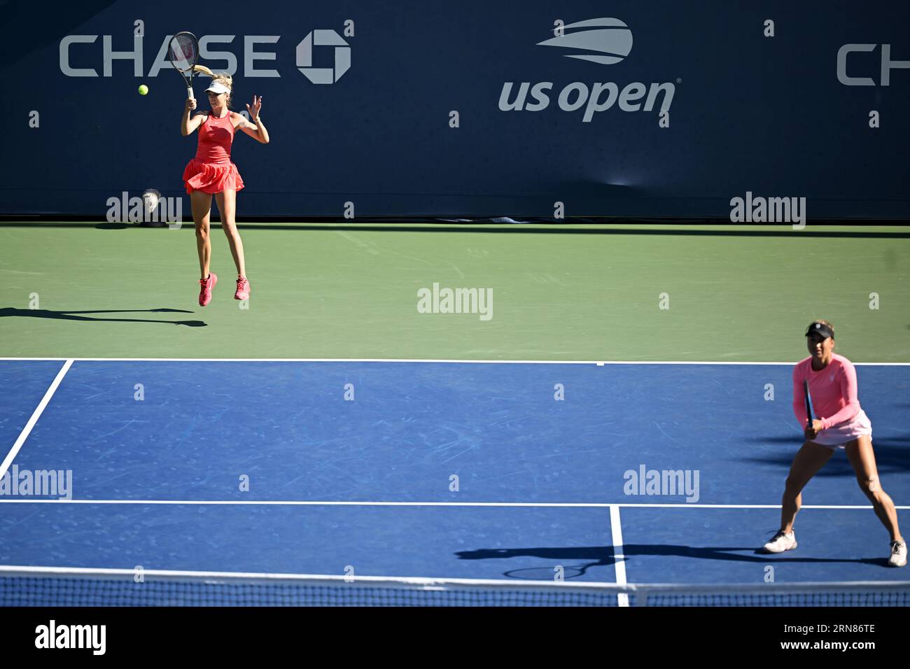 Katie Boulter and Yulia Putintseva in action during a women's doubles