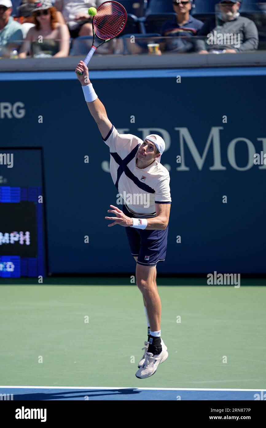 John Isner in action during a mens singles match at the 2023 US Open, Thursday, Aug