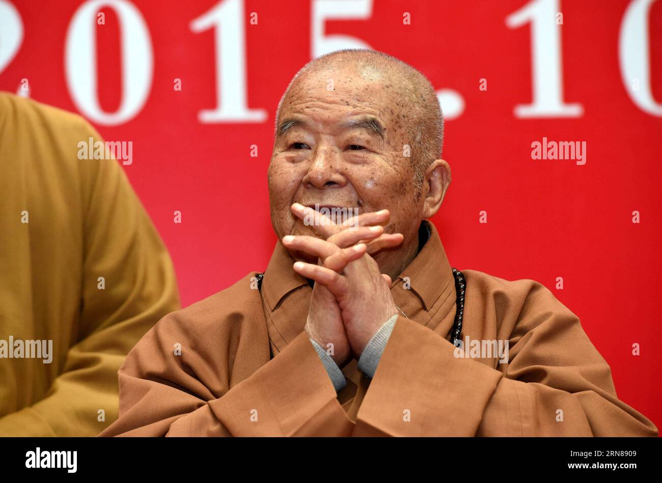 (151012) -- NANJING, Oct. 12, 2015 -- Master Hsing Yun, founder of the influential Fo Guang Shan Monastery in southeast China s Taiwan, greets attendees during the launching ceremony of an academy built for Chinese art research in a campus of Nanjing University in Nanjing, capital of east China s Jiangsu Province, Oct. 12, 2015. The academy building is named after Hsing Yun for his devotion in 2010 to the project. Located inside the building, the Li Chimao Art Museum was officially opened on Monday. ) (yxb) CHINA-NANJING-NEW COLLEGE BUILDING (CN) SunxCan PUBLICATIONxNOTxINxCHN   151012 Nanjing Stock Photo