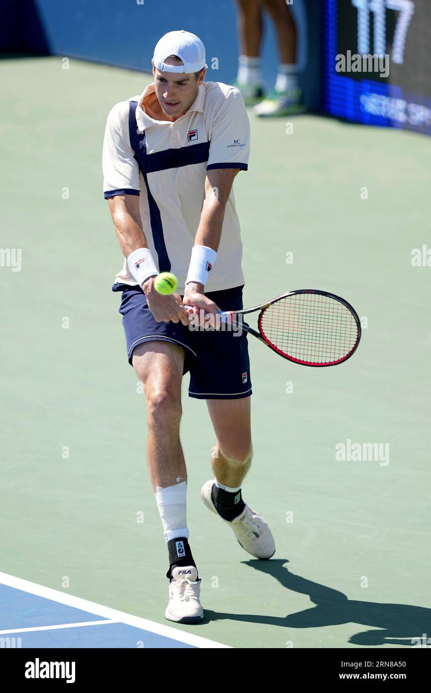 John Isner in action during a mens singles match at the 2023 US Open, Thursday, Aug