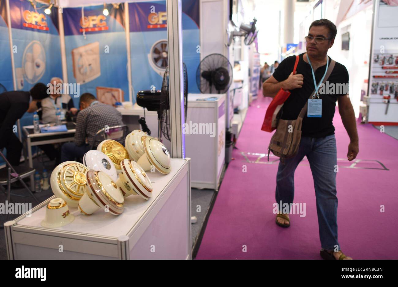 (151016) -- GUANGZHOU, Oct. 16, 2015 -- A visitor is seen at the Pakistan booth during the China Import and Export Fair, or the Canton Fair, in Guangzhou, capital of south China s Guangdong Province, Oct. 16, 2015. A total of 353 enterprises from countries and regions along the Belt and Road participated the current Canton Fair held in Guangzhou, which took nearly 60 percent of all exhibitors. The Belt and Road initiative, standing for the Silk Road Economic Belt and the 21st Century Maritime Silk Road, was unveiled by Chinese President Xi Jinping in 2013. It brings together countries in Asia, Stock Photo