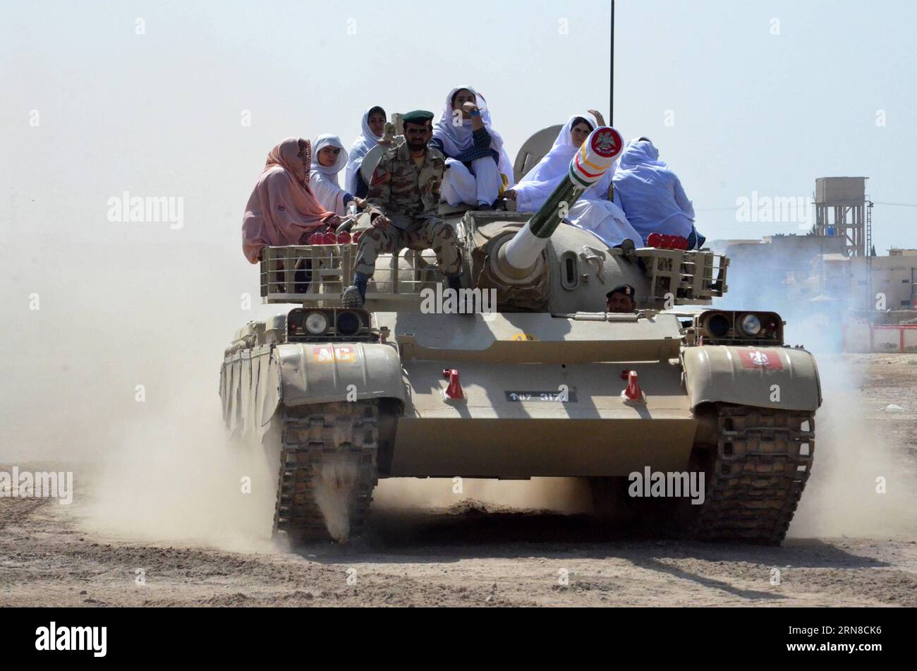 (151017) -- QUETTA, Oct. 17, 2015 -- Female students ride on a tank during a weapon training session in southwest Pakistan s Quetta, Oct. 17, 2015. Authorities have commenced special weapon training sessions for female students of Sardar Bahadur Khan Women s University in Quetta. ) PAKISTAN-QUETTA-FEMALE STUDENTS-WEAPON-TRAINING Irfan PUBLICATIONxNOTxINxCHN   Quetta OCT 17 2015 Female Students Ride ON a Tank during a Weapon Training Session in Southwest Pakistan S Quetta OCT 17 2015 Authorities have commenced Special Weapon Training Sessions for Female Students of Sardar Bahadur Khan Women S U Stock Photo
