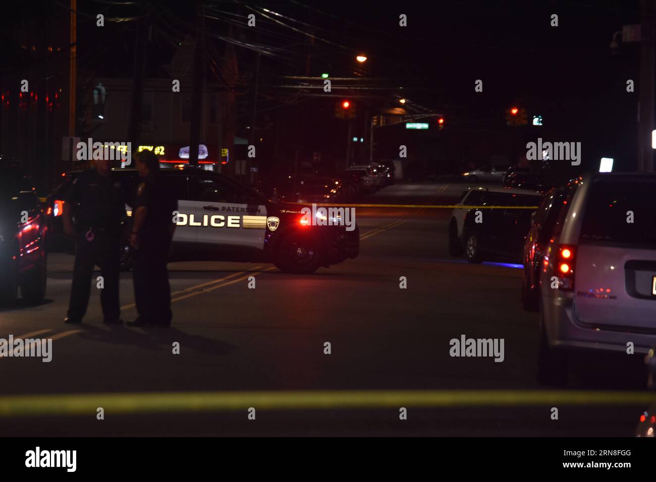 Paterson, United States. 30th Aug, 2023. Crime scene tape and Paterson police vehicles block the area surrounding the crime scene. Two people were shot in Paterson. The two victims were brought to the hospital, Wednesday evening after being shot around 8:49 PM. Multiple police vehicles and officers were present at the scene, investigating the shooting. (Photo by Kyle Mazza/SOPA Images/Sipa USA) Credit: Sipa USA/Alamy Live News Stock Photo