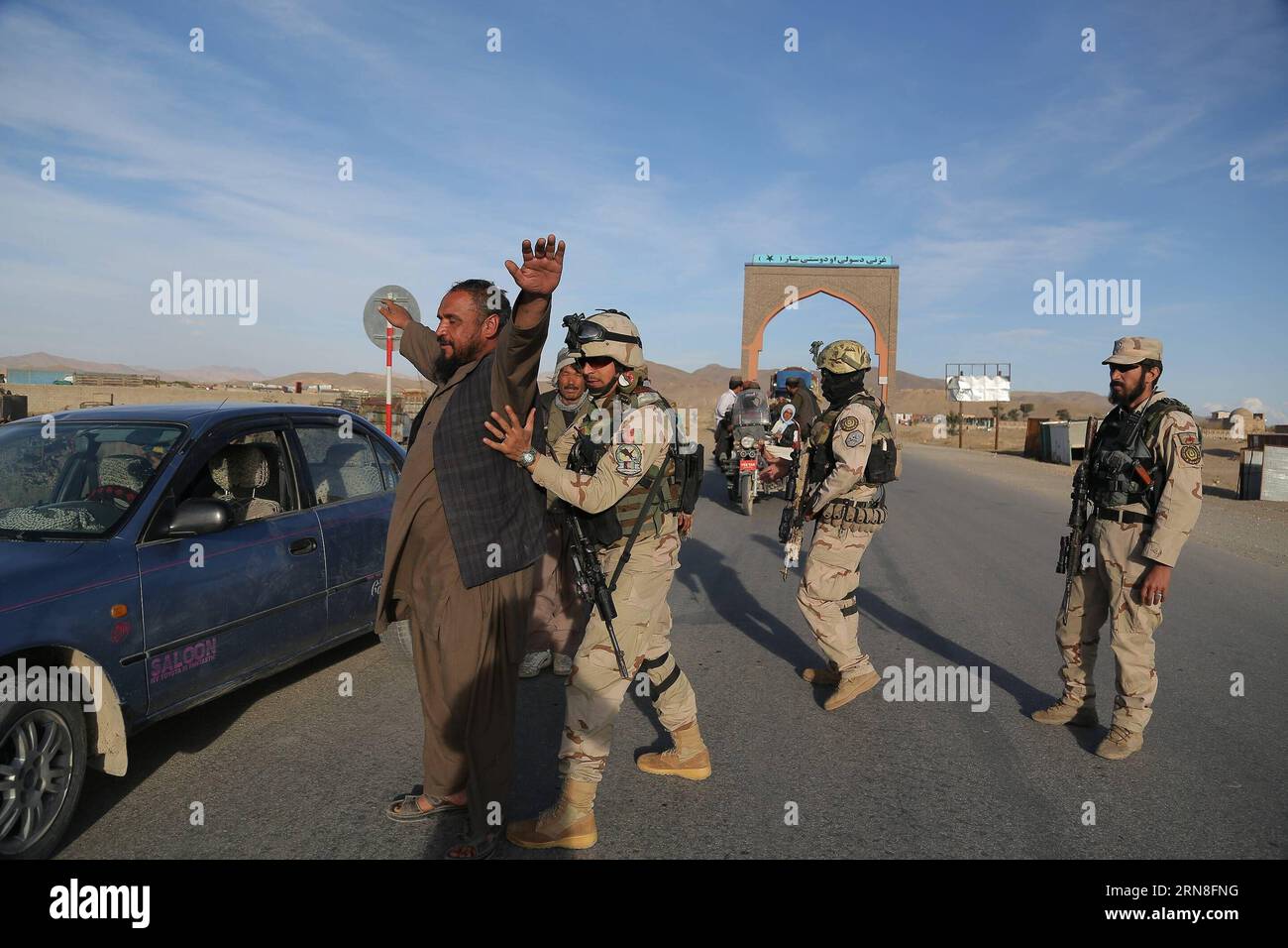 151022) -- GHAZNI, Oct. 22, 2015 -- An Afghan special force soldier  searches a passenger near a checkpoint in Ghazni city, capital of eastern  Ghazni province, Afghanistan, Oct. 22, 2015. Governor of