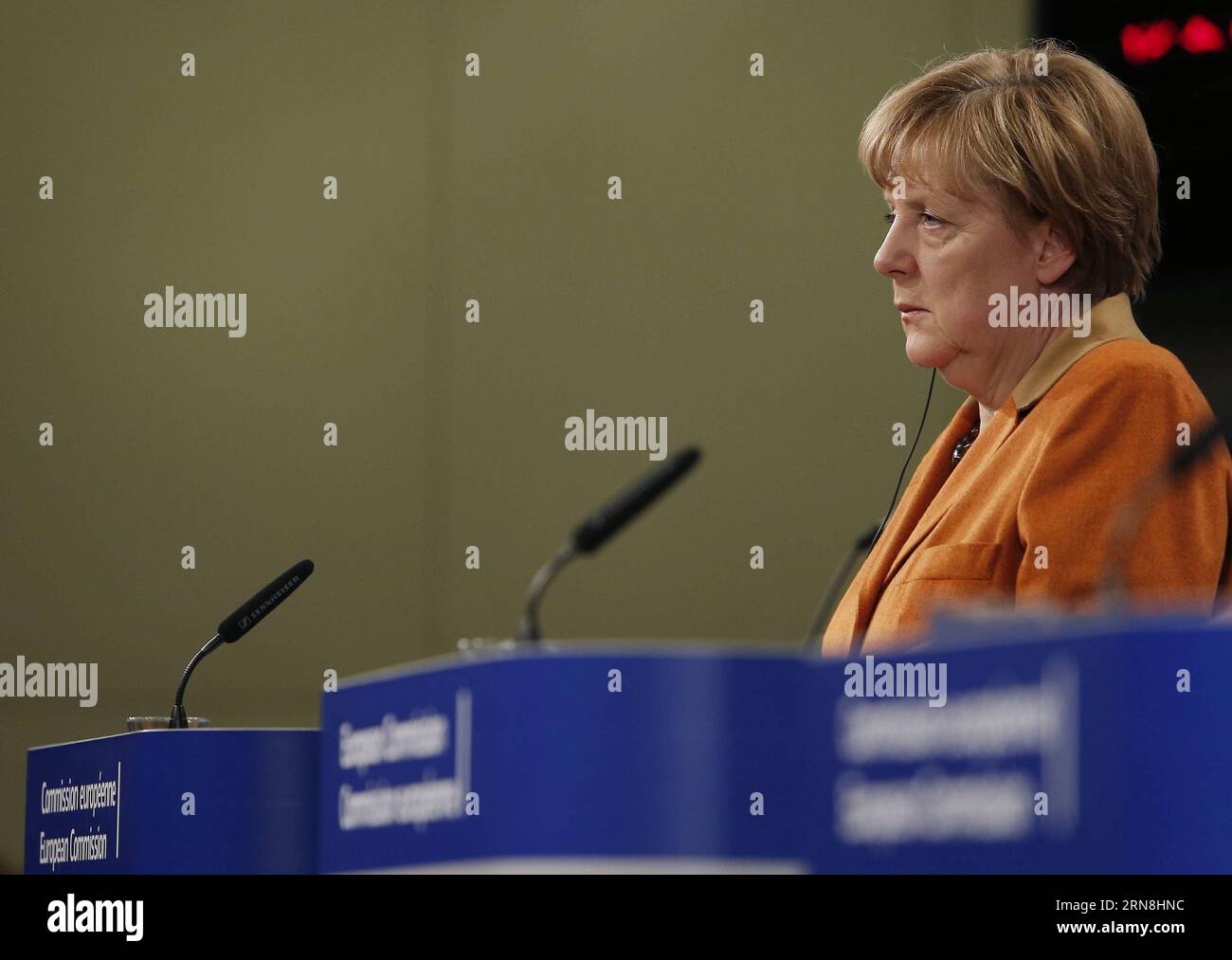 German Chancellor Angela Merkel looks up during a press conference with European Commission President Jean-Claude Juncker (not seen) and the UN s High Commissioner for Refugees Antonio Guterres (not seen) at the end of the special EU summit with Western Balkan nations situated along the migrant routes into Europe in Brussels, Belgium, on Oct. 26, 2015. The European Union (EU) and Balkan countries are seeking further cooperation on tackling migrant crisis at a mini summit held here on Sunday. Zhou Lei) BELGIUM-EU SPECIAL SUMMIT-REFUGEE-WESTERN BALKAN ?? PUBLICATIONxNOTxINxCHN   German Chancello Stock Photo