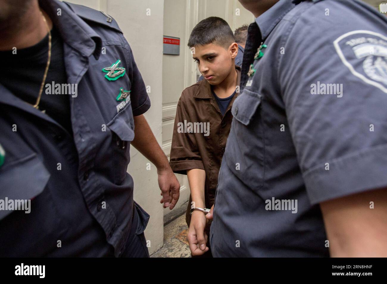 (151025) -- JERUSALEM, Oct. 25, 2015 -- 13-year-old Palestinian Ahmed Manasra is seen at the Magistrate s Court in Jerusalem, on Oct. 25, 2015. Ahmed Manasra and his cousin Hassan stabbed a 13-year-old Israeli boy and a 25-year-old Israeli man in Jerusalem s neighborhood of Pisgat Ze ev earlier this month. () MIDEAST-JERUSALEM-TEENAGE STABBER-AHMED MANASRA-COURT Xinhua/JINI PUBLICATIONxNOTxINxCHN   Jerusalem OCT 25 2015 13 Year Old PALESTINIAN Ahmed  IS Lakes AT The Magistrate S Court in Jerusalem ON OCT 25 2015 Ahmed  and His Cousin Hassan stabbed a 13 Year Old Israeli Boy and a 25 Year Old I Stock Photo