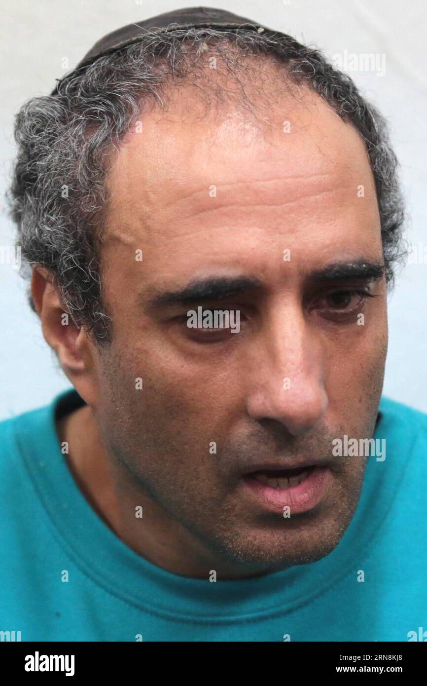 (151028) -- JERUSALEM, Oct. 28, 2015 -- Hagai Amir, the brother and primary accomplice to the assassin of Israel s former prime minister Yitzhak Rabin, is seen prior to a court session at a court in Tel Aviv, Israel, on Oct. 28, 2015. The brother and primary accomplice to the assassin of Israel s former prime minister Yitzhak Rabin was detained by the police on Tuesday over a Facebook post wishing the Israeli President would soon pass from the world. The post by Hagai Amir, brother of convicted assassin Yigal Amir, came at the time when Israel is commemorating the 20th anniversary for Rabin s Stock Photo