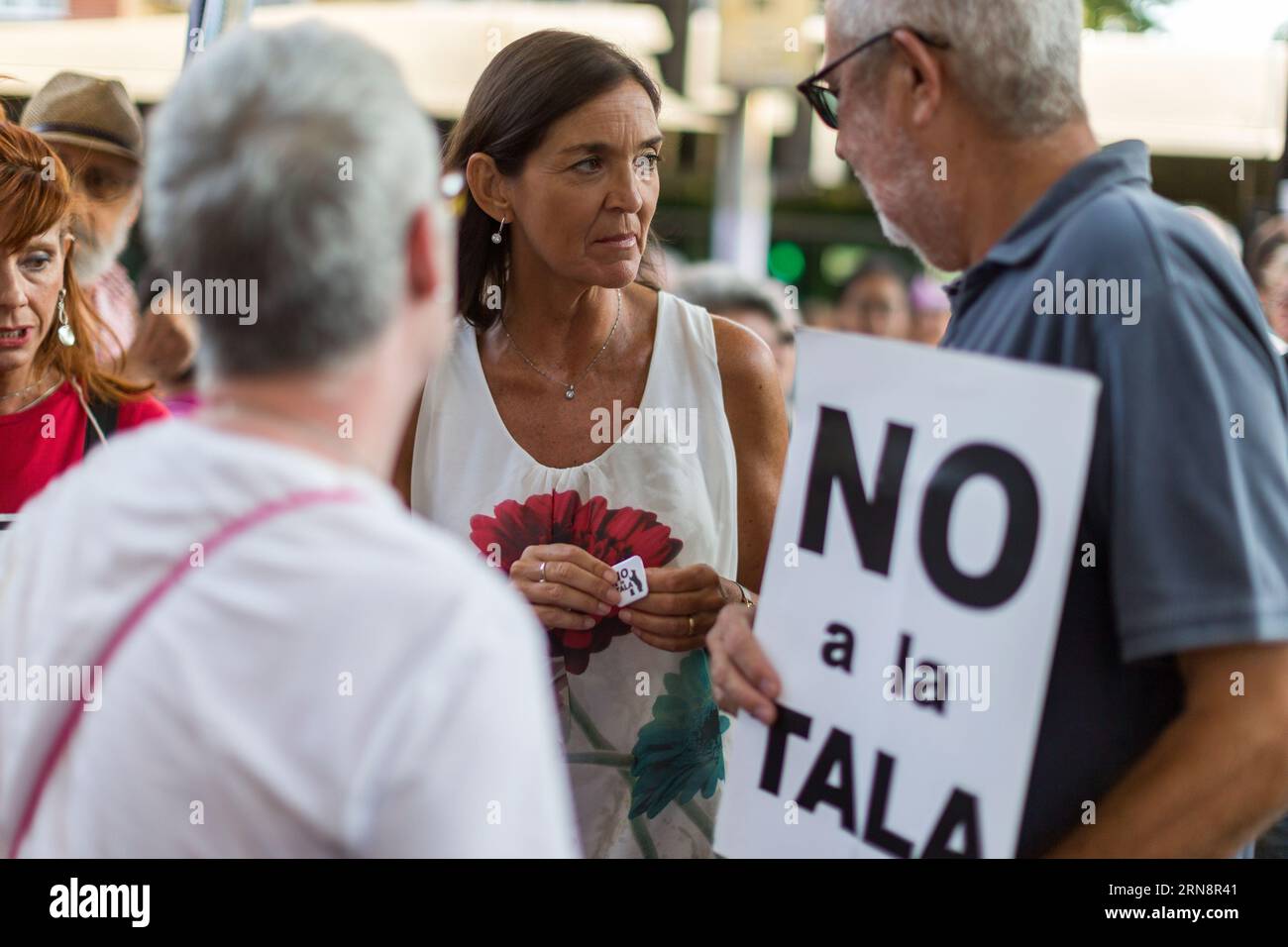 Madrid, Spain. 31st Aug, 2023. Reyes Maroto, spokesman for the Municipal Socialist Group in the Madrid City Council (center), speaks with residents, during a demonstration organized by residents fighting against the felling of 1,027 trees that the government of Isabel Diaz Ayuso intends to carry out to expand the line 11 of the Madrid Metro. (Photo by Luis Soto/SOPA Images/Sipa USA) Credit: Sipa USA/Alamy Live News Stock Photo