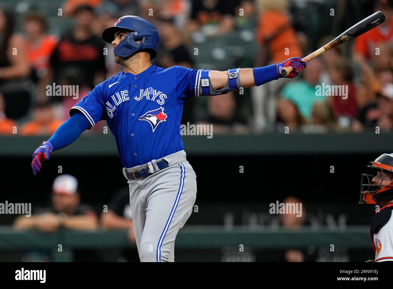 Toronto Blue Jays' Whit Merrifield follows through on a swing during the  first inning of a baseball game between the Baltimore Orioles and the  Toronto Blue Jays, Wednesday, Aug. 23, 2023, in