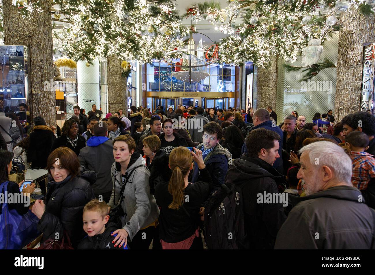 Bargain hunters crowd the Macy s Herald Square flagship store in