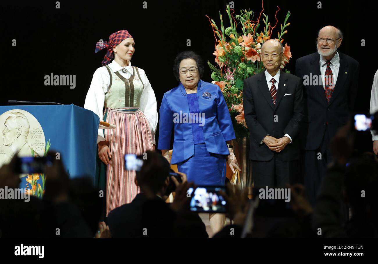 (151207) -- STOCKHOLM, Dec. 7, 2015 -- China s Tu Youyou (2nd L) who won 2015 Nobel Prize in Physiology or Medicine attends a lecture in Karolinska Institutet, Stockholm, capital of Sweden, Dec. 7, 2015. ) SWEDEN-STOCKHOLM-NOBEL PRIZE-MEDICINE-LECTURE YexPingfan PUBLICATIONxNOTxINxCHN   151207 Stockholm DEC 7 2015 China S TU Youyou 2nd l Who Won 2015 Nobel Prize in Physiology or Medicine Attends a Lecture in Karolinska Institutet Stockholm Capital of Sweden DEC 7 2015 Sweden Stockholm Nobel Prize Medicine Lecture YexPingfan PUBLICATIONxNOTxINxCHN Stock Photo