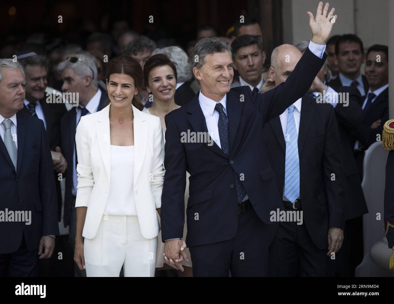 (151211) -- BUENOS AIRES, Dec. 11, 2015 -- Argentina s President Mauricio Macri (R Front) leaves with First Lady Juliana Awada (2nd L) after taking part in the Tedeum at the Metropolitan Cathedral in Buenos Aires, capital of Argentina, Dec. 11, 2015. According to local press, Mauricio Macri attended Friday with Argentina s Vice President Gabriela Michetti and his Cabinet the traditional religious service at the Metropolital Cathedral, one day after his pesidential inauguration. Martin Zabala) (jg) (fnc) ARGENTINA-BUENOS AIRES-POLITICS-PRESIDENT e MARTINxZABALA PUBLICATIONxNOTxINxCHN   151211 B Stock Photo