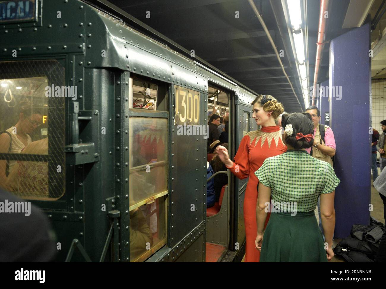 (151213) -- NEW YORK, Dec. 13, 2015 -- Passengers experience antique cars at a subway station in New York City, the United States, Dec. 13, 2015. Starting on Dec. 6th and running for the following three Sundays, the MTA NYC runs the nostalgia train Shoppers Special, which boasts eight cars running from the 1930s to the 1970s. ) U.S.-NEW YORK-SUBWAY-NOSTALGIA TRAIN WangxLei PUBLICATIONxNOTxINxCHN   151213 New York DEC 13 2015 Passengers Experience Antique Cars AT a Subway Station in New York City The United States DEC 13 2015 Star ON DEC 6th and RUNNING for The following Three SUNDAYS The MTA N Stock Photo