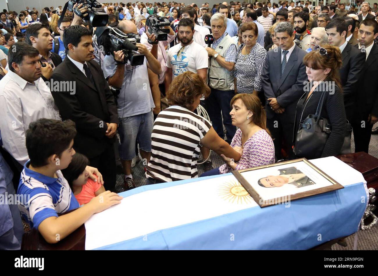 Argentina s Vice President Gabriela Michetti (2nd R, Front) accompanies the relatives of the officers that were killed in an accident, at the Forum Conventions Center, Santiago del Estero, Argentina, Dec. 15, 2015. Argentina s President Mauricio Macri (not in the photo) has announced a 24-hour national mourning for the 43 national officers that died on Monday when their bus tipped over, near the locality of Rosario de la Frontera, in Salta Province, northeast Argentina. Emilio Rapetti/) (rtg) (ah) ARGENTINA-SANTIAGO DEL ESTERO-ACCIDENT-BUS TELAM PUBLICATIONxNOTxINxCHN   Argentina S Vice Presid Stock Photo