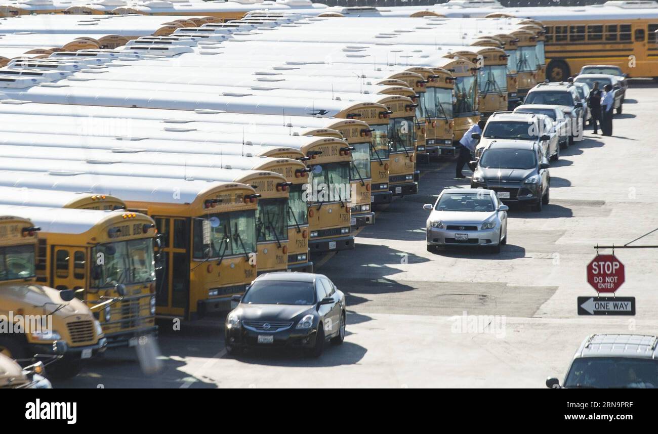(151215) -- LOS ANGELES, Dec. 15, 2015 -- School buses are parked at Los Angeles Unified School District (LAUSD) Gardena garage in Los Angeles, the United States, Dec. 15, 2015. All LAUSD schools will stay closed today in response to a reported bomb threat, Schools Superintendent Ramon Cortines said. Police said the threat was called in to a School Board member. The threat is involving backpacks and packages left at campuses. The closures applied to all LAUSD campuses, around 900 of them. Los Angeles Unified School District is the second-largest school district in United States, which has more Stock Photo