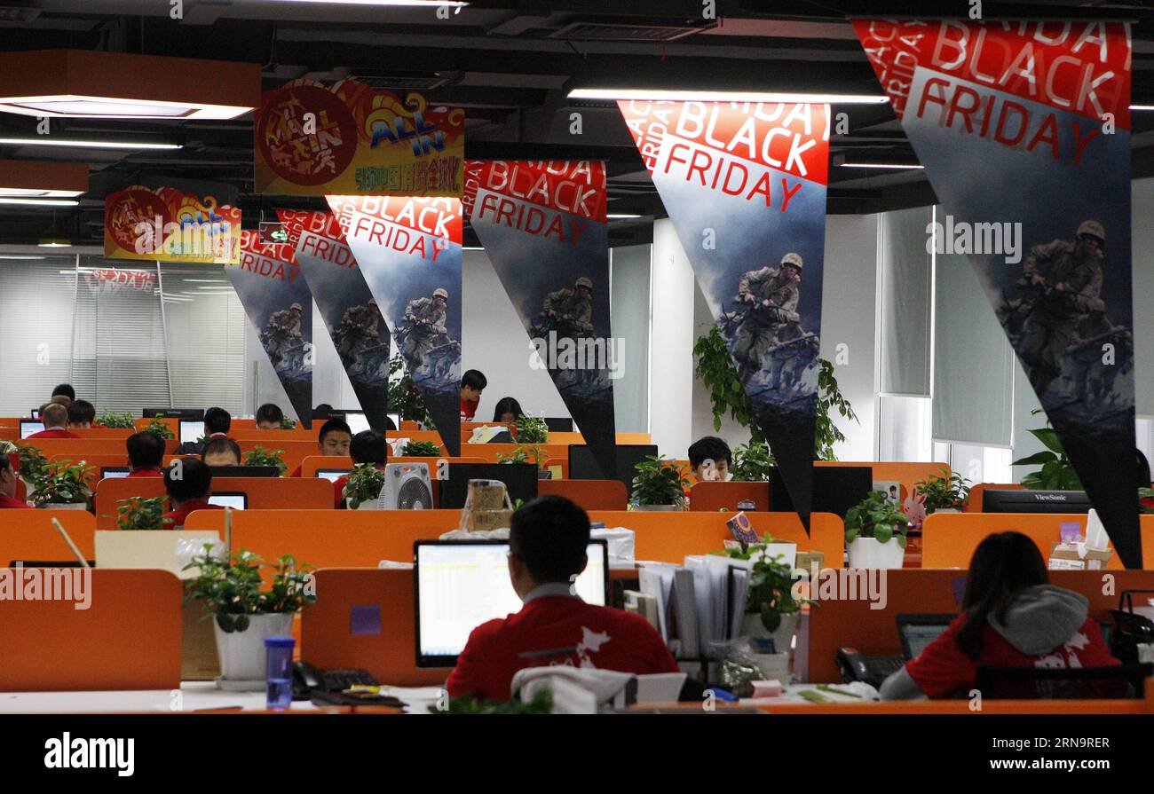File photo taken on Nov. 16, 2015 shows posters of U.S. Black Friday , a day that Americans go shopping after celebrating Thanksgiving Day, at the office of a cross-border e-commerce platform in Shanghai, east China. The U.S. e-commerce holiday also attracted many Chinese online shoppers to purchase foreign goods. As host of the Second World Internet Conference (WIC) that is underway in Wuzhen in east China s Zhejiang Province, China called for global Internet interconnectivity and shared governance by all. As one of the greatest inventions of the 20th century, the Internet has turned the glob Stock Photo