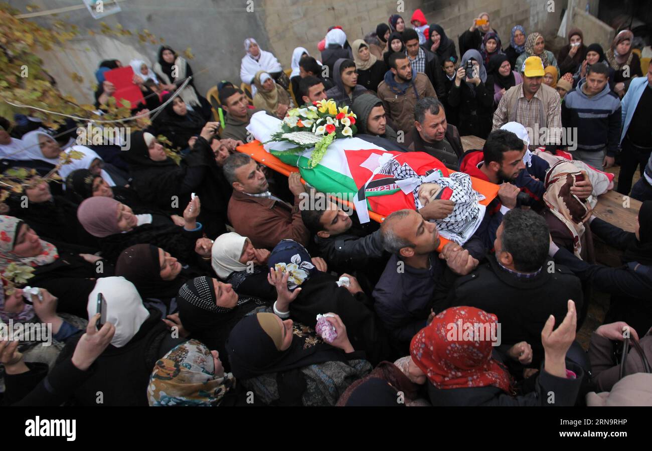 (151218) -- Nablus, Dec. 18, 2015 -- Mourners carry the body of Palestinian girl Samah Abdallah during her funeral in the West Bank village of Amorya near Nablus, Dec 17, 2015. Abdallah died on Wednesday from wounds she sustained after being shot by Israeli forces while sitting in a car along with her father on Nov. 23, according to the hospital medics. Nidal Eshtayeh) MIDEAST-NABLUS-FUNERAL EmadxDrimly PUBLICATIONxNOTxINxCHN   Nablus DEC 18 2015 Morne Carry The Body of PALESTINIAN Girl Samah Abdallah during her Funeral in The WEST Bank Village of  Near Nablus DEC 17 2015 Abdallah died ON Wedn Stock Photo